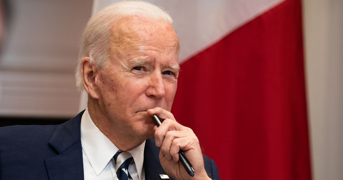 President Joe Biden looks on during a virtual meeting with Mexican President Andrés Manuel López Obrador in the Roosevelt Room of the White House on Monday in Washington, D.C.