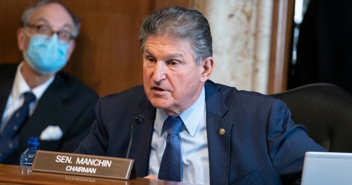 Democratic Sen. Joe Manchin of West Virginia speaks at a confirmation hearing before the Senate Energy and Natural Resources Committee on Feb. 24, 2021, on Capitol Hill in Washington, D.C.