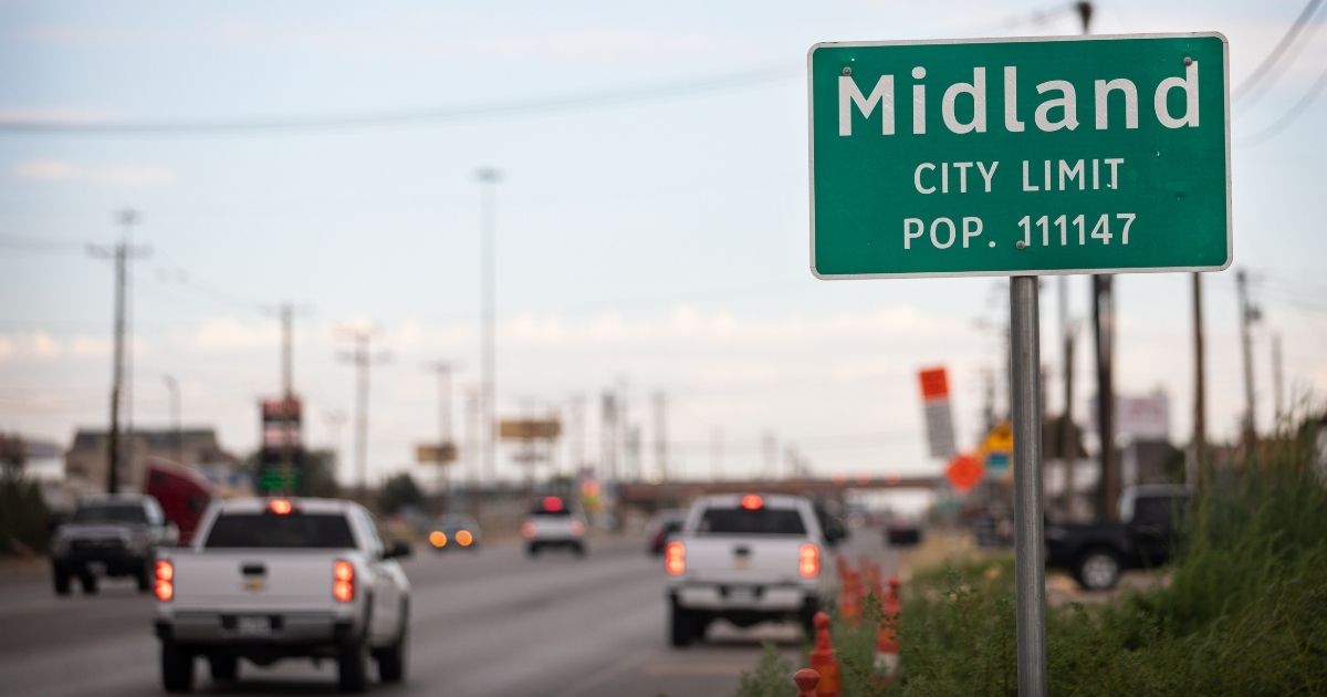 A road sign posted for drivers entering Midland, Texas, is seen on July 29.