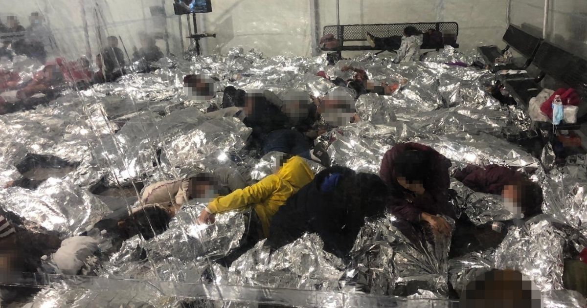 This photo of the CBP facility in Donna, Texas, shows migrants packed together.