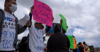 Migrants and asylum seekers demonstrate at the San Ysidro crossing port asking U.S. authorities to allow them to start their migration process in Tijuana, Baja California state, Mexico, on Tuesday.