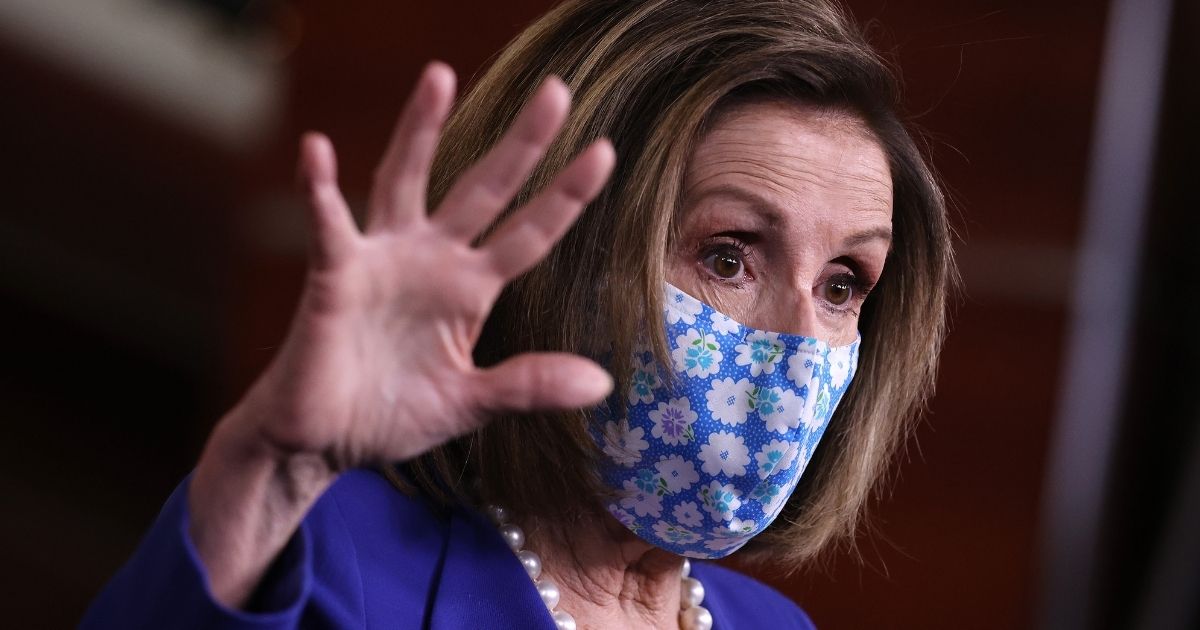 Speaker of the House Nancy Pelosi holds a news conference in the U.S. Capitol Visitors Center on March 19, 2021, in Washington, D.C.