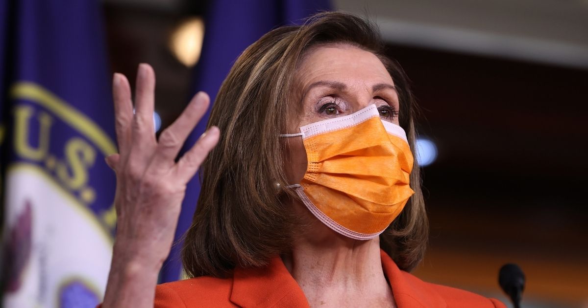 Speaker of the House Nancy Pelosi speaks during a news conference with Democrats from the House and Senate to discuss proposed gun violence prevention legislation at the U.S. Capitol Visitors Center on Thursday in Washington, D.C.