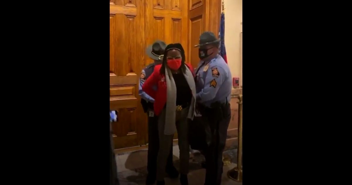 Democratic Georgia state Rep. Park Cannon was arrested and had to be forcibly removed by state troopers from the state Capitol on Thursday.