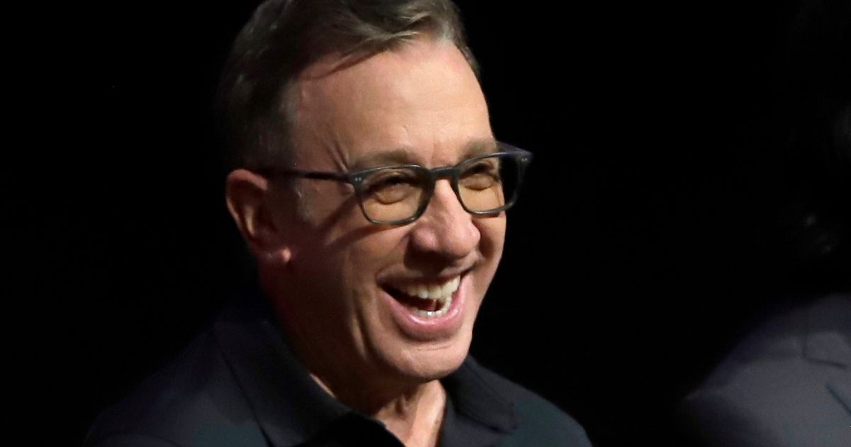 Tim Allen laughs during a media event for "Toy Story 4" at Disney's Hollywood Studios Orlando, Florida, on June 8, 2019.