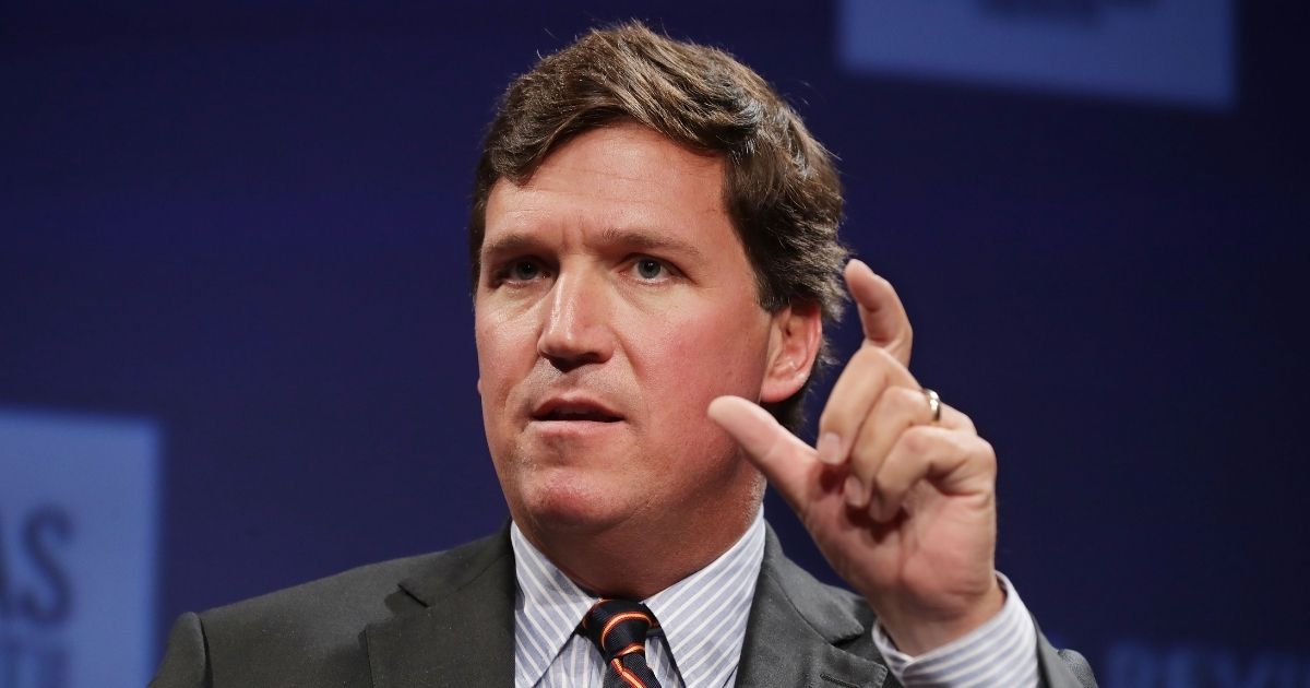 Fox News host Tucker Carlson speaks at the National Review Institute's Ideas Summit at the Mandarin Oriental Hotel on March. 29, 2019, in Washington, D.C.