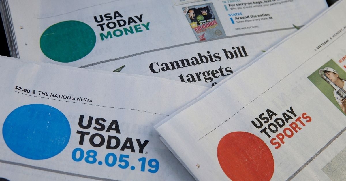 Sections of a USA Today newspaper rest together in Norwood, Massachusetts, on Aug. 5, 2019.