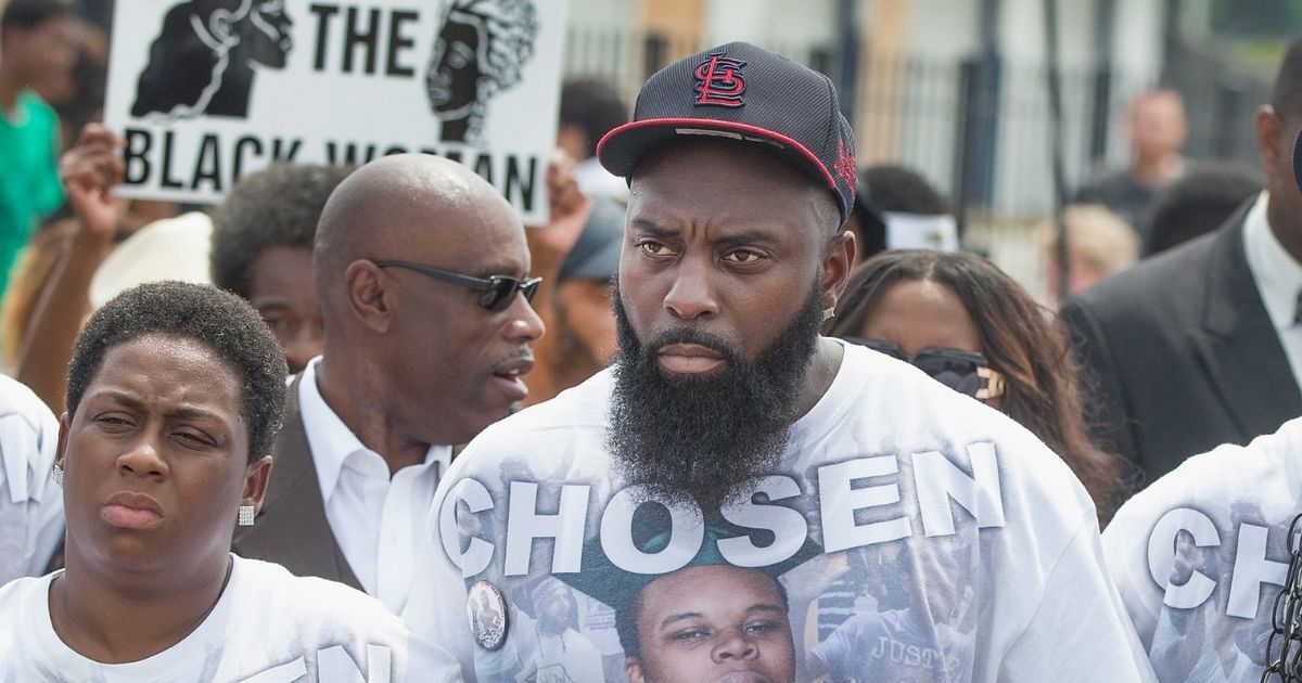Michael Brown Sr. leads a march in 2015 in Ferguson, Missouri, on the anniversary of his son's death in a police shooting in August 2014.