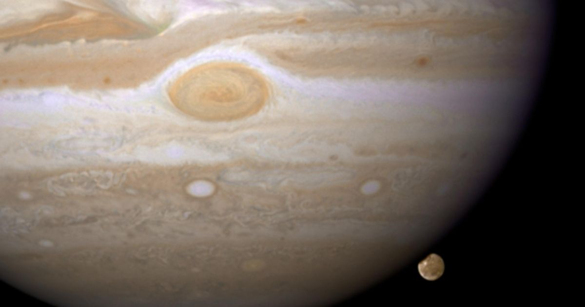 Jupiter and its largest moon, Ganymede, as seen from the Hubble Space Telescope on April 9, 2007.