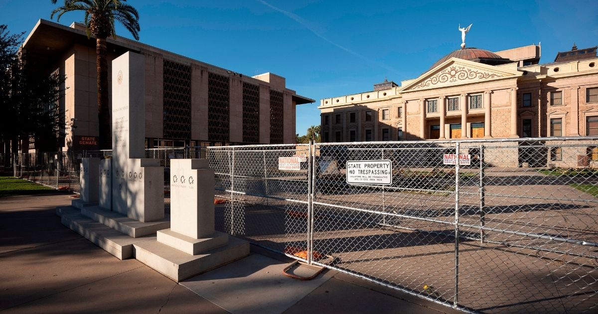 Fences are seen around the state capitol in Phoenix, Arizona, on Jan. 17, 2021. (