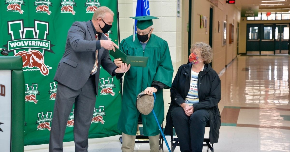 Raymond Schaefer, 96, is awarded his high school diploma nearly 80 years after dropping out to help his family.