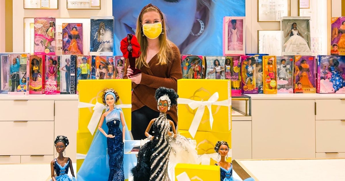 Sara Ahmed is pictured with some of the dolls she donated to Birthday Bash Box after discovering the collection in the home she bought in Texas.