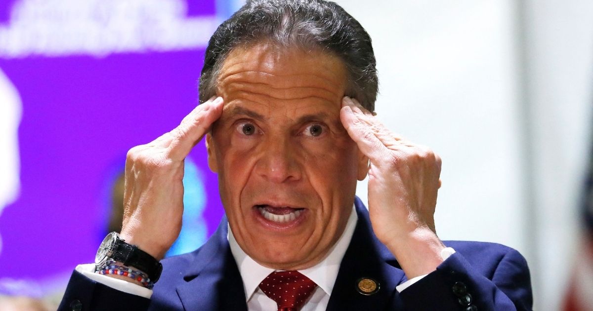 New York Gov. Andrew Cuomo gestures during a speech in the Harlem section of New York City's Manhattan borough on April 23.