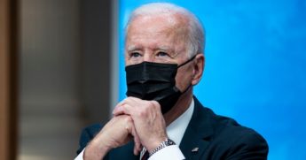 President Joe Biden listens during a virtual climate summit with 40 world leaders in the East Room of the White House in Washington on Thursday.