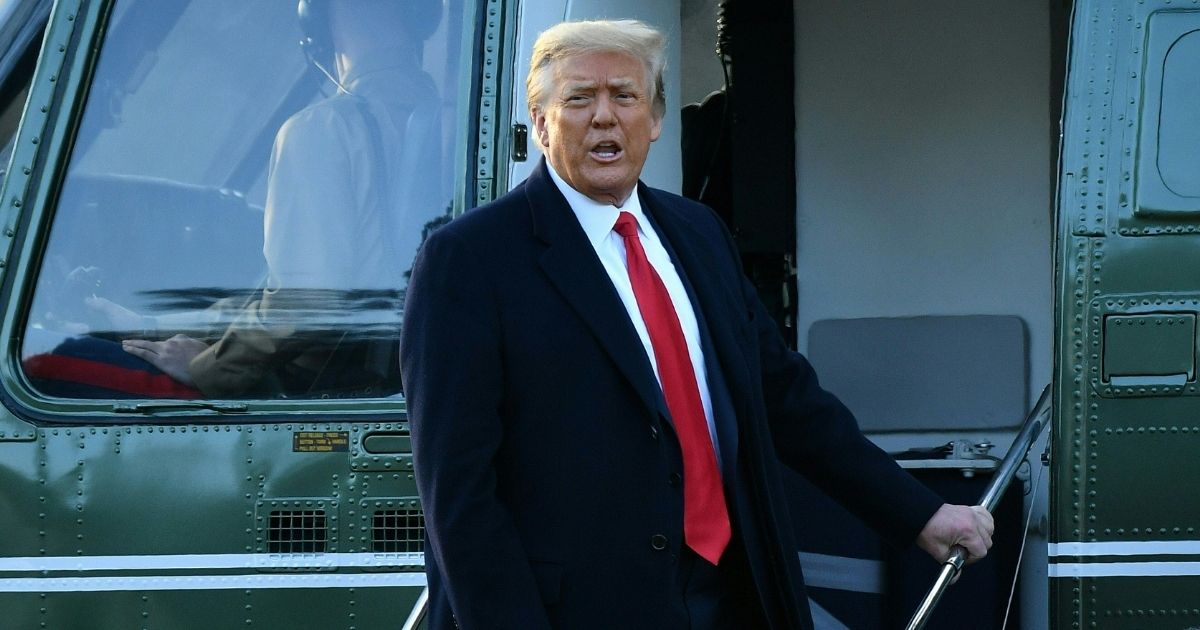 Then-President Donald Trump speaks as he boards Marine One at the White House in Washington, D.C., on Jan. 20, 2021.