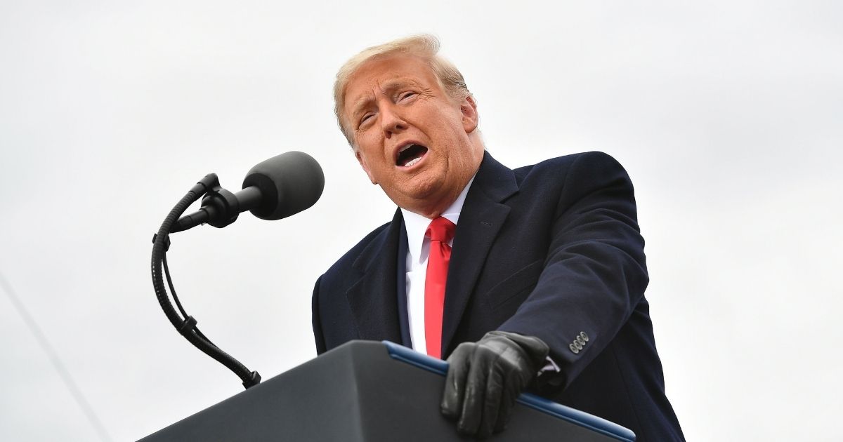 Then-President Donald Trump speaks at a "Make America Great Again" rally at Oakland County International Airport on Oct. 30, 2020, in Waterford Township, Michigan.