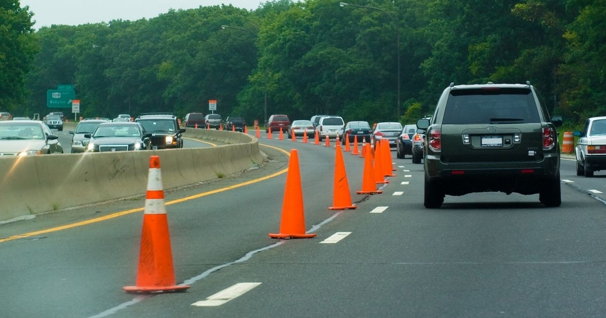 The above stock image shows roadwork on the highway.