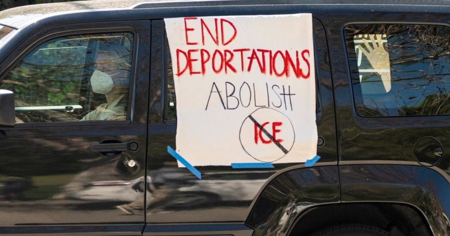 Motorists cruise around the Silver Lake Reservoir in a "Reunite Our Families Now!'' rally to protest deportations in Los Angeles on March 6, 2021.