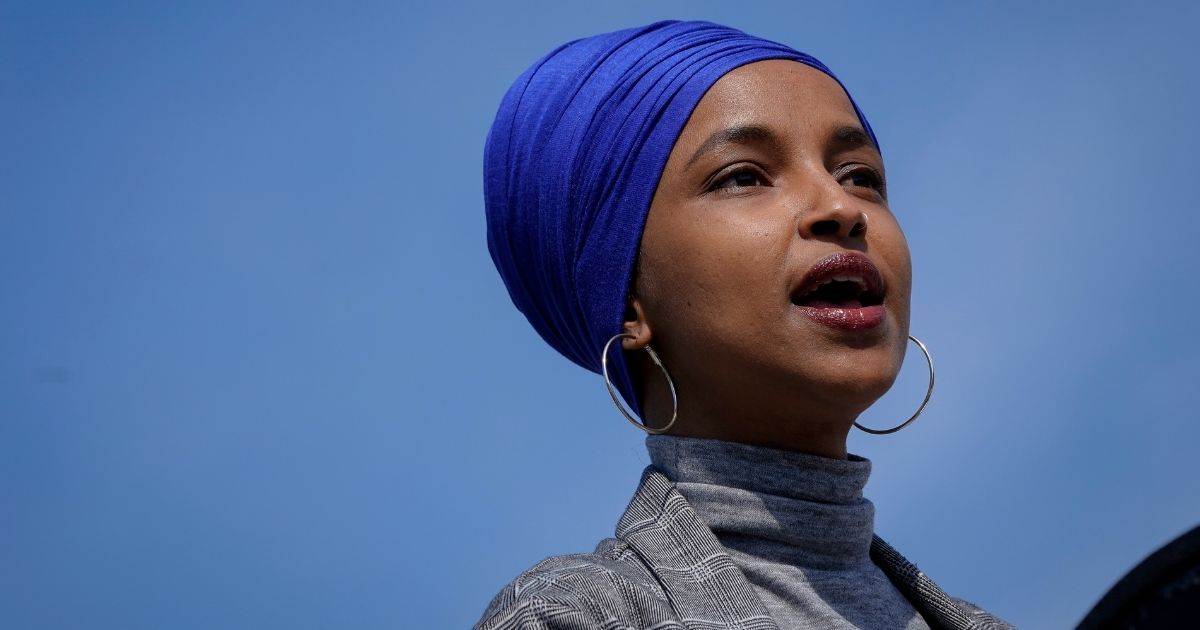 Democratic Rep. Ilhan Omar of Minnesota speaks during a news conference outside the U.S. Capitol on March 11, 2021, in Washington, D.C.