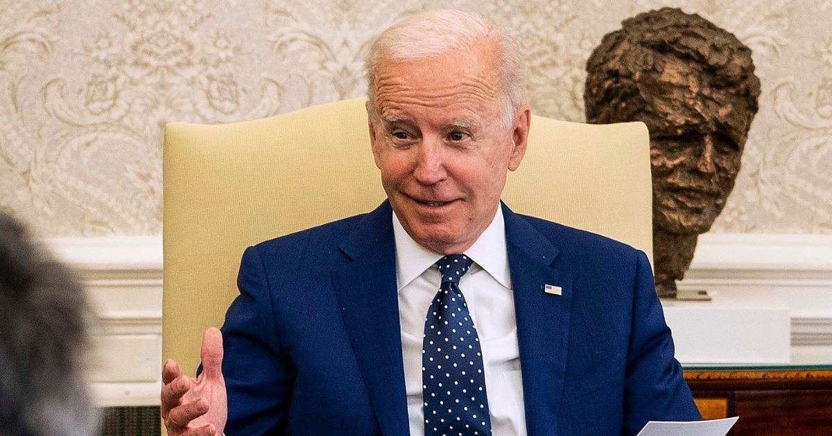 President Joe Biden conducts a meeting in the Oval Office at the White House on Thursday in Washington, D.C.