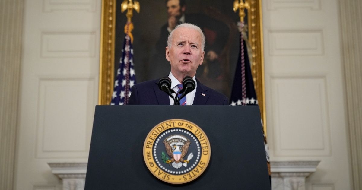 President Joe Biden speaks about the March jobs report in the State Dining Room of the White House on April 2 in Washington, D.C.