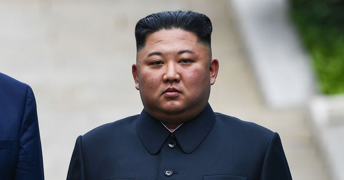 North Korea's leader Kim Jong Un poses at the Military Demarcation Line that divides North and South Korea, in the Joint Security Area (JSA) of Panmunjom in the Demilitarized zone (DMZ) on June 30, 2019.