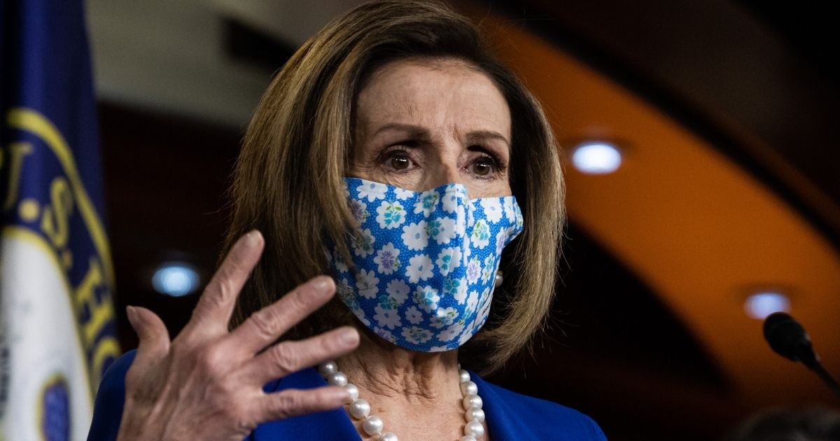 Speaker of the House Nancy Pelosi gestures during a news conference in the U.S. Capitol Visitors Center in Washington on March 19.