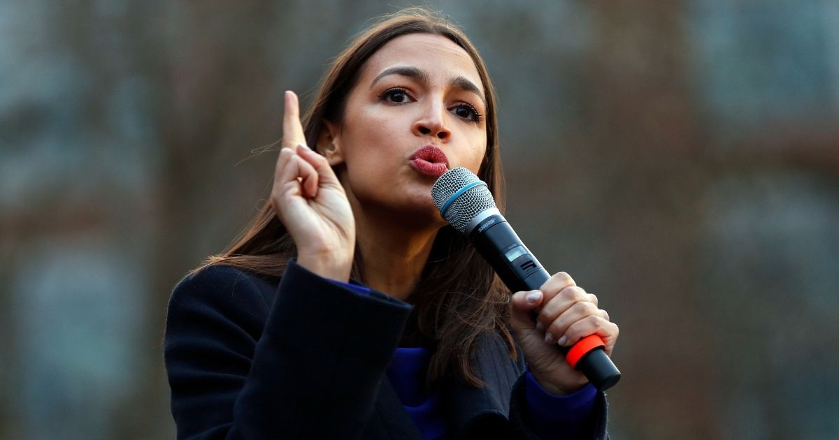 Democratic Rep. Alexandria Ocasio-Cortez of New York speaks at a campaign rally for then-Democratic presidential candidate Sen. Bernie Sanders in Ann Arbor, Michigan, on March 8, 2020