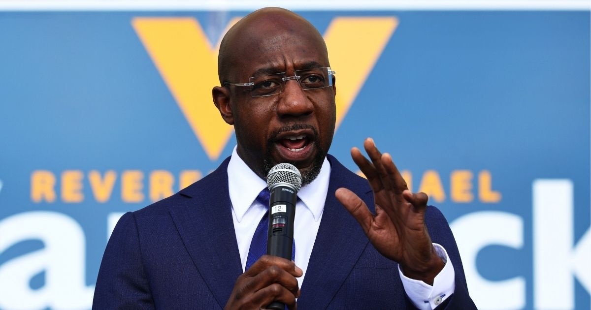 Raphael Warnock, then a Georgia Senate candidate, speaks at his Labor Canvass Launch at IBEW Local 613 on Jan. 5, 2021, in Marietta, Georgia.