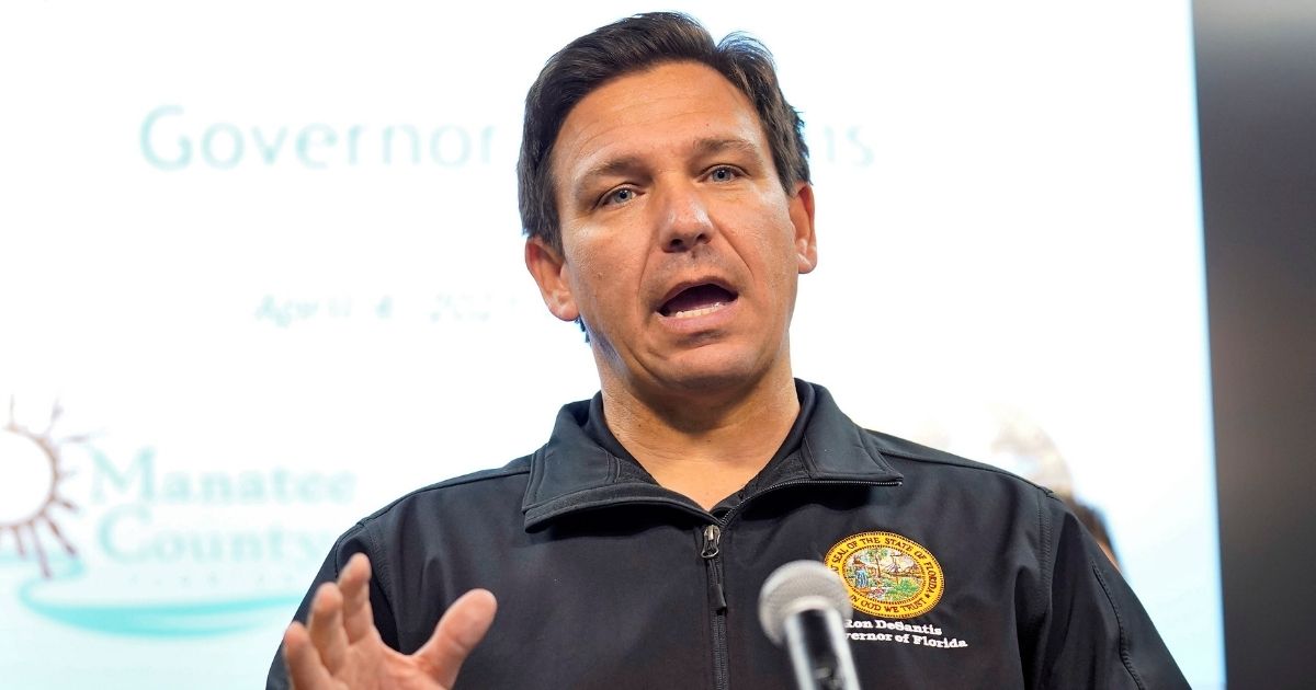 Florida Gov. Ron DeSantis gestures during a news conference April 4, 2021, at the Manatee County Emergency Management office in Palmetto, Florida.