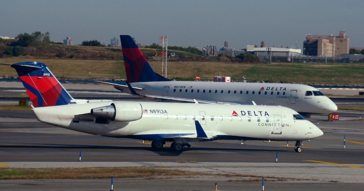 Delta Air Lines jets taxi at LaGuardia Airport in New York City.