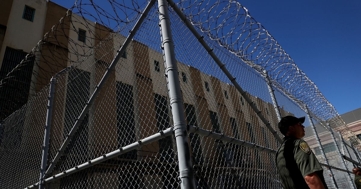 A California Department of Corrections and Rehabilitation officer stands guard at San Quentin State Prison on Aug. 15, 2016, in San Quentin, California.