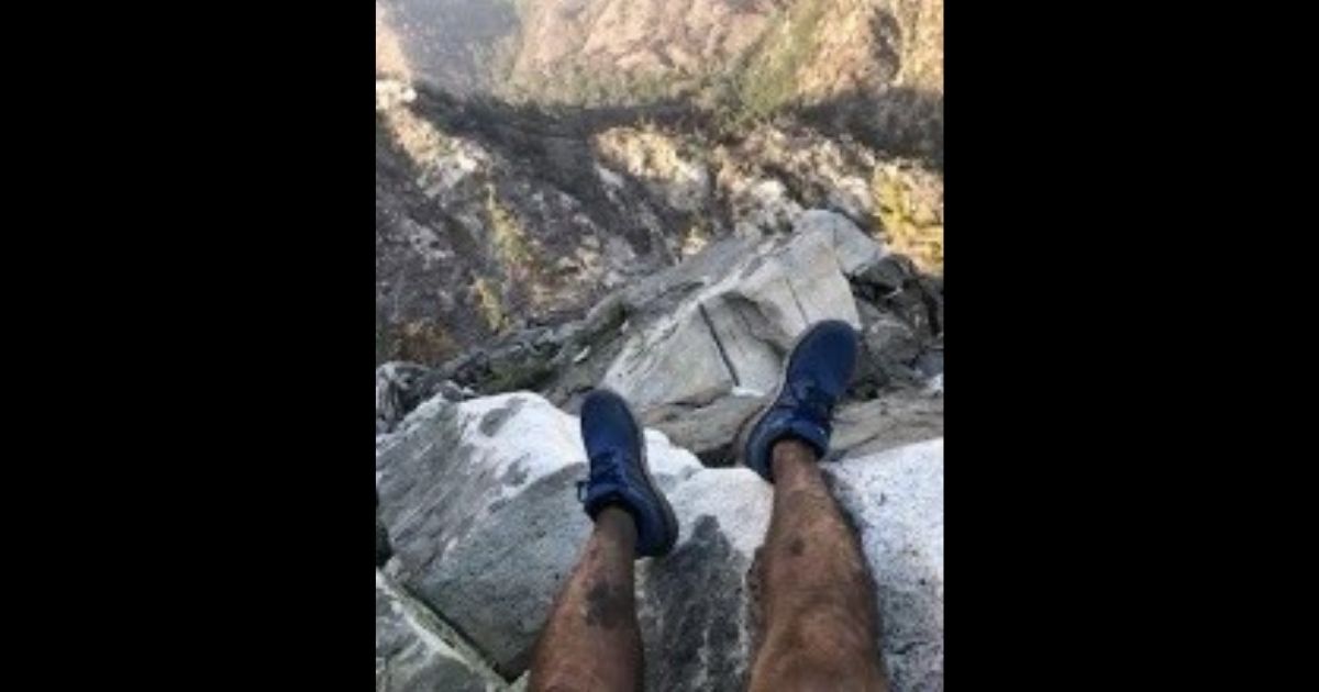 A lost hiker was found after sending a friend a photo of his location shortly before his cellphone died.