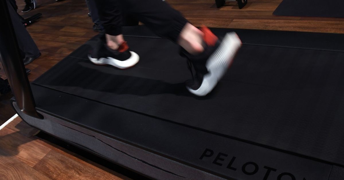 A woman runs on a Peloton Tread treadmill on Jan. 11, 2018, in Las Vegas, Nevada.