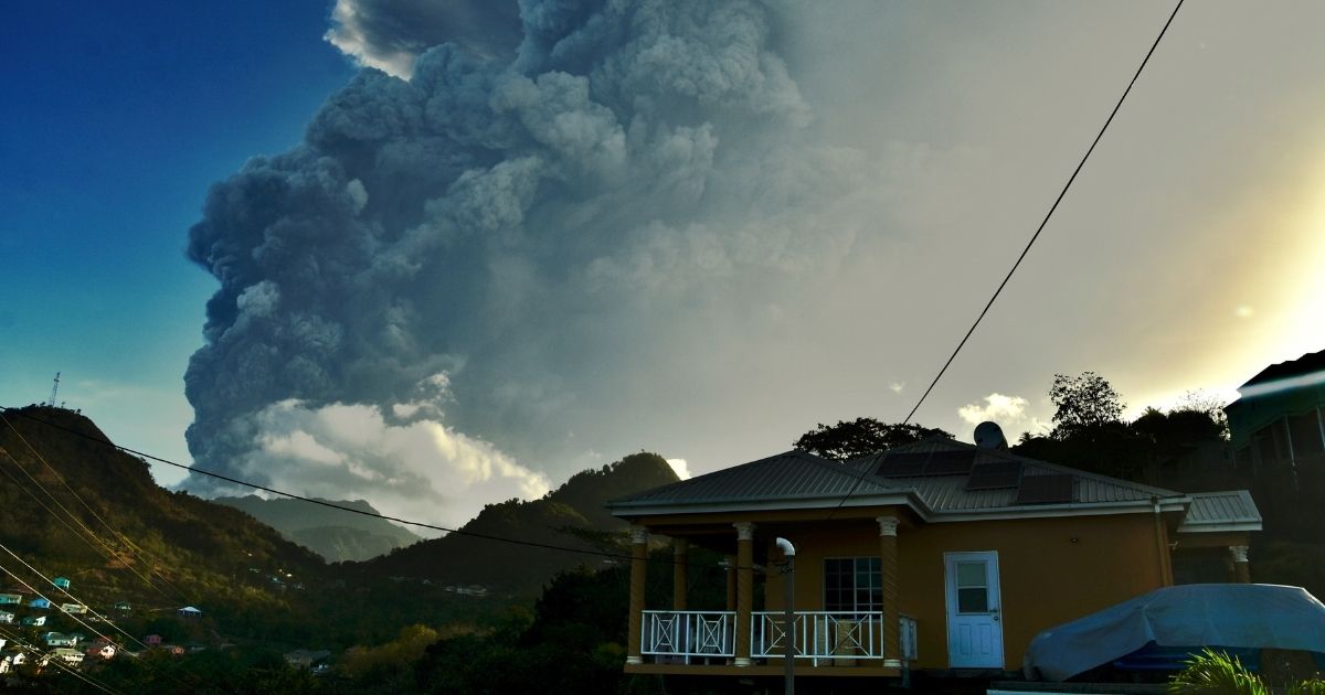Ash rises into the air as La Soufriere volcano erupts on the eastern Caribbean island of St. Vincent on Tuesday.