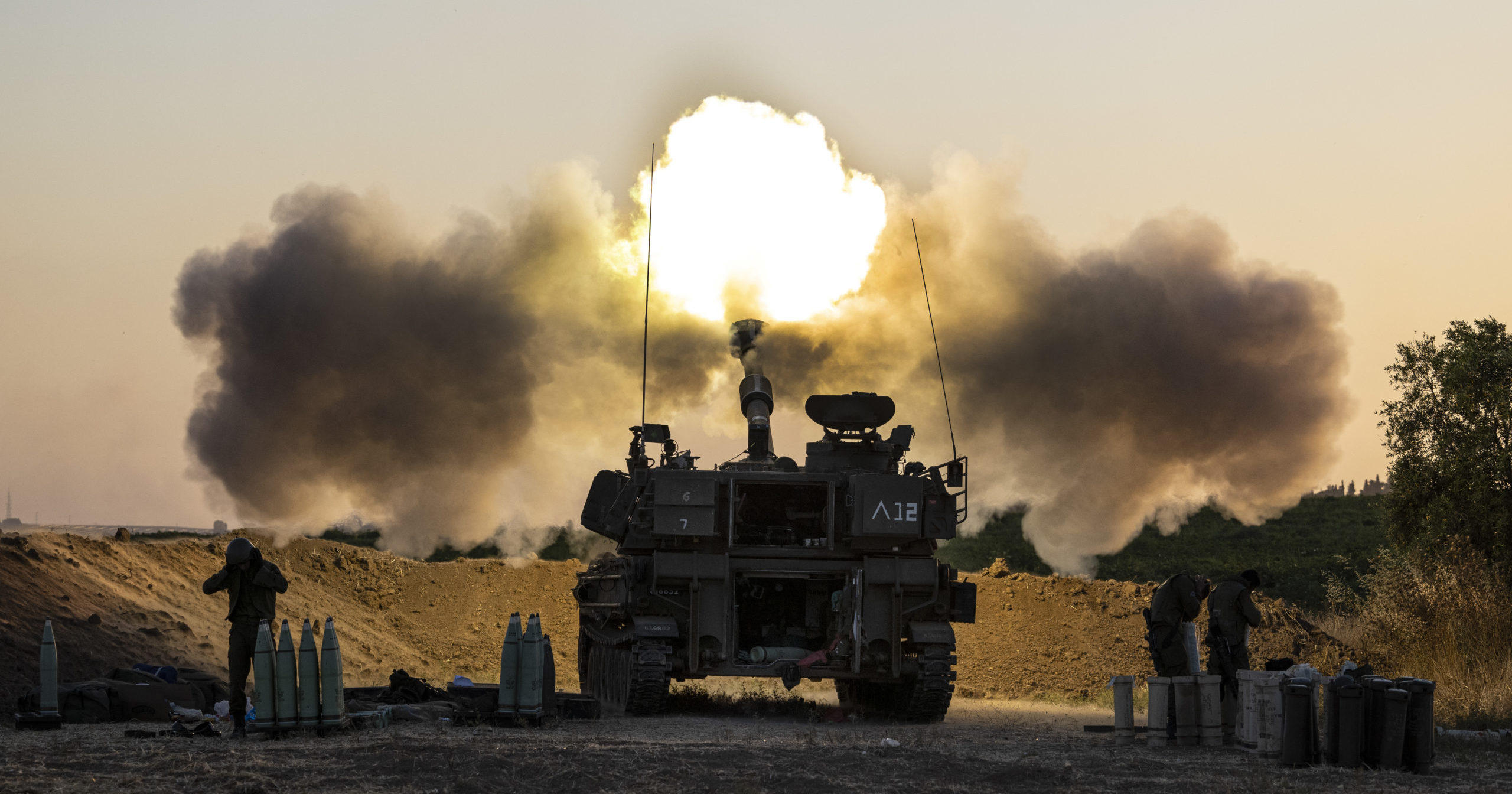 An Israeli artillery unit fires shells towards targets in Gaza on Wednesday.