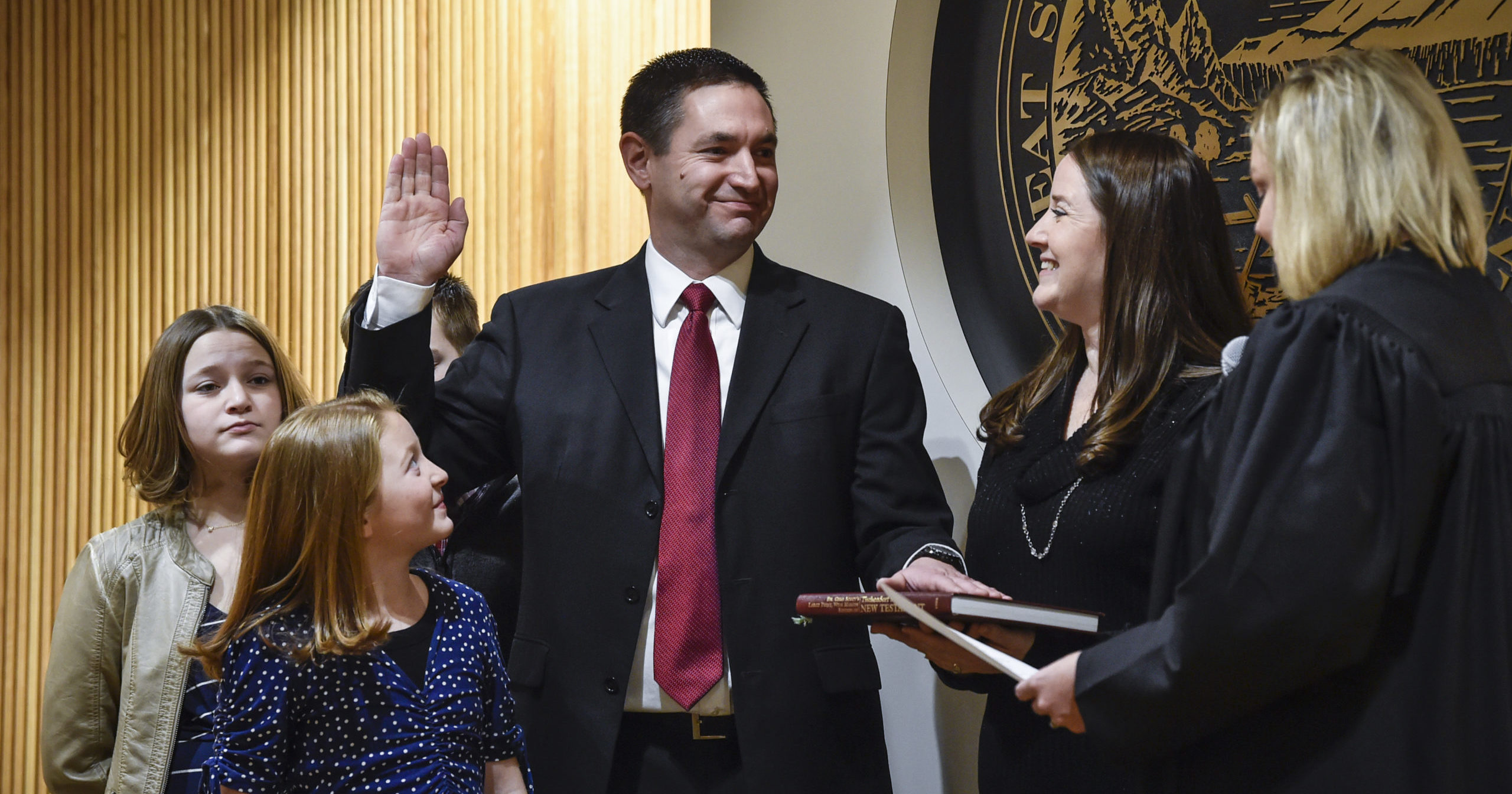 Montana Attorney General Austin Knudsen is sworn into office at the Montana State Capitol in Helena, Montana, on Jan. 4, 2021.