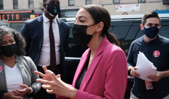 Democratic Rep. Alexandria Ocasio-Cortez of New York visits a mobile vaccination site in the Bronx on Friday afternoon.