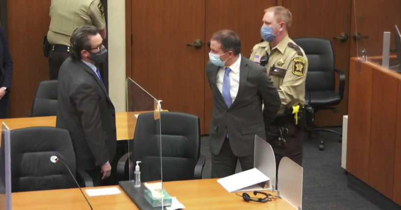 In this April 20, 2021 file image from video, former Minneapolis police officer Derek Chauvin, center, is taken into custody as his attorney, Eric Nelson, left, looks on, after the verdicts were read at Chauvin's trial for the 2020 death of George Floyd at the Hennepin County Courthouse in Minneapolis, Minnesota.