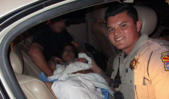 State troopers helped deliver a baby being born in a car on May 21.