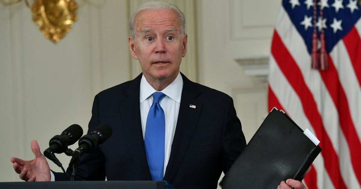 President Joe Biden gestures during an event in the State Dining Room of the White House in Washington on Wednesday.