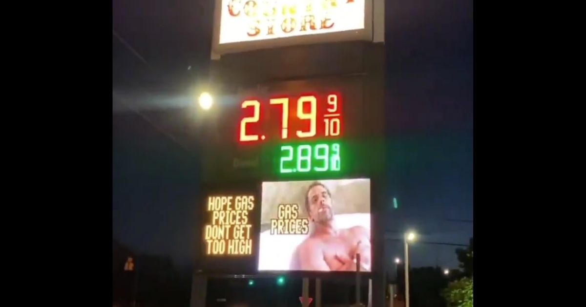 A gas station sign displays an image mocking Hunter Biden.