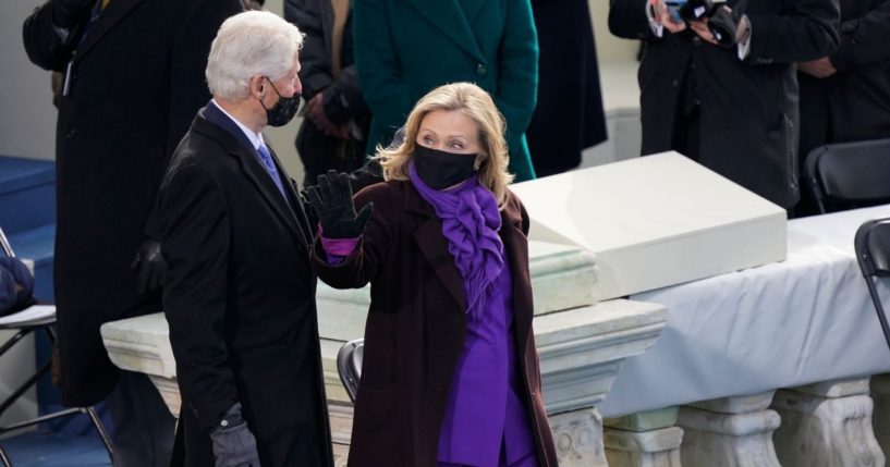 Former President Bill Clinton and former Secretary of State Hillary Clinton arrive for the 59th Presidential Inauguration at the U.S. Capitol in Washington on Jan. 20, 2021.