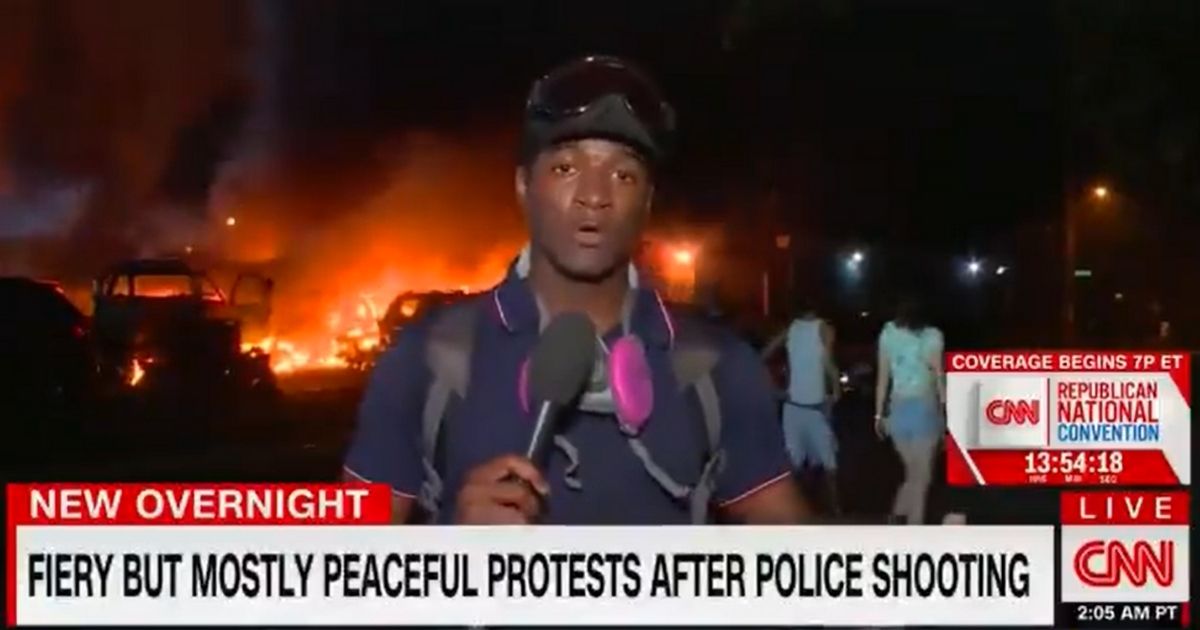 A chyron on CNN describes the riot in Kenosha, Wisconsin, as "fiery but mostly peaceful."