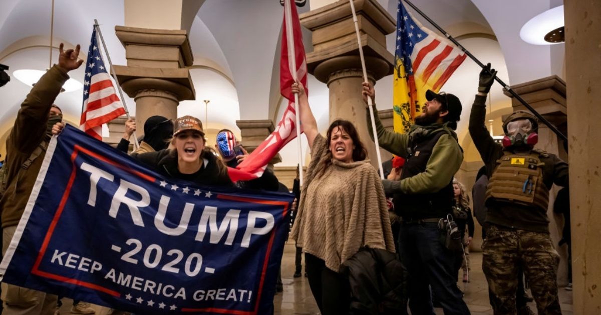 Supporters of then-President Donald Trump protest after breaching the U.S. Capitol on Jan. 6, 2021, in Washington, D.C.