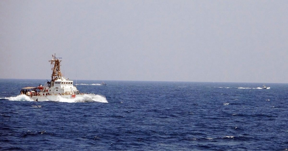 Two Iranian Islamic Revolutionary Guard Corps Navy fast in-shore attack craft, a type of speedboat armed with machine guns, conducted unsafe and unprofessional maneuvers while operating in close proximity to USCGC Maui as it transits the Strait of Hormuz with other U.S. naval vessels, May 10, 2021.