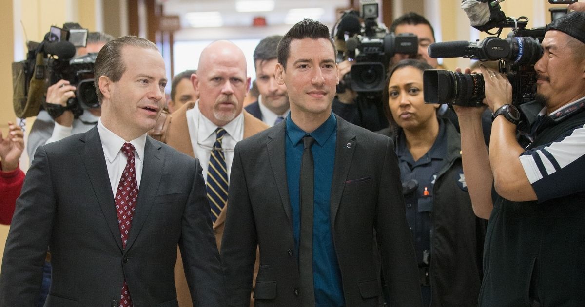 Pro-life journalist David Daleiden, right, arrives with attorney Jared Woodfill, left, and Terry Yates for court on Feb. 4, 2016, in Houston.