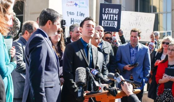 David Daleiden, a defendant in an indictment stemming from a Planned Parenthood video, speaks to the media after appearing in court at the Harris County Courthouse on Feb. 4, 2016, in Houston.