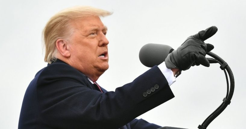 Then-President Donald Trump speaks at a "Make America Great Again" rally at Oakland County International Airport on Oct. 30, 2020, in Waterford Township, Michigan.