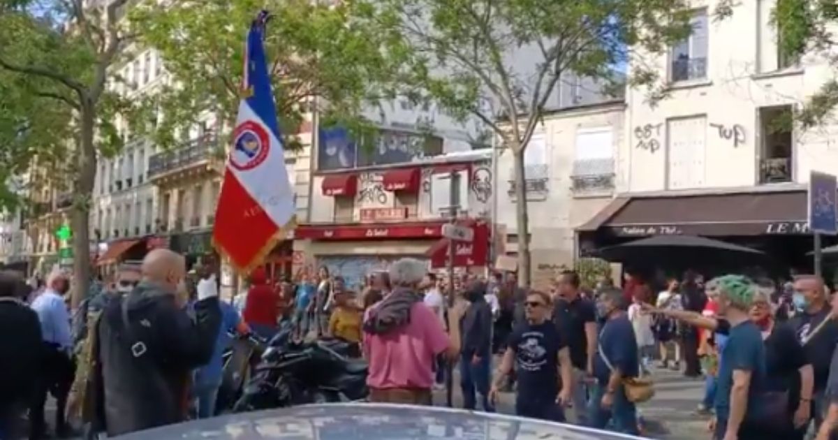 Demonstrators attacked a French procession over the weekend commemorating the deaths of Catholics at the hands of French revolutionaries in the 1870s, multiple sources said.